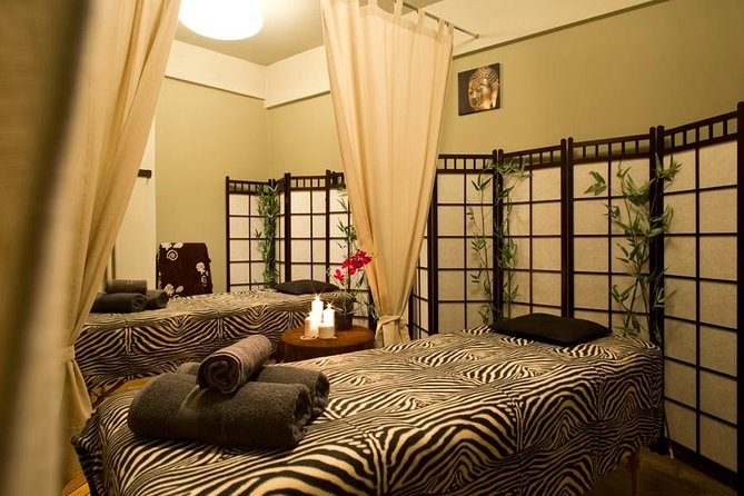 1-Hour Aroma Oil Massage plus 20-Minute Free Fish Pedi - A fish pedicure before the massage
