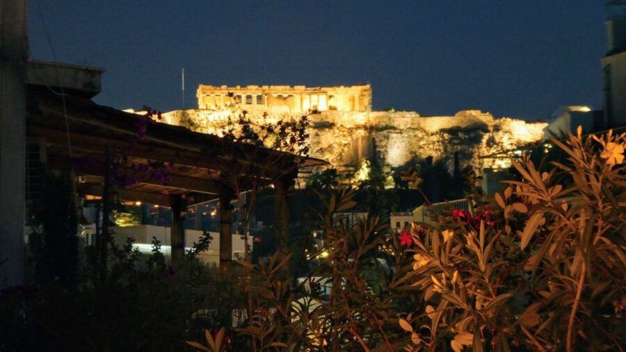 Athens: 7-Course Dinner and Wine Pairing with Acropolis View - A rooftop table with the Acropolis in view