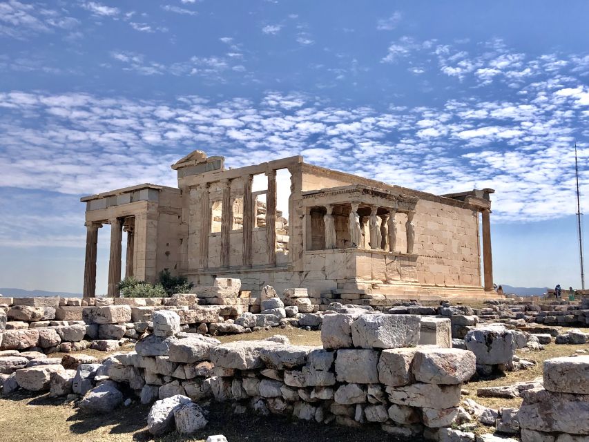 Athens:Acropolis - Historical Center Walking Tour in Spanish - Athena, Poseidon, and the city’s founding story