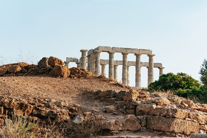 Athens: Cape Sounion and Poseidon Temple Sunset with Audio Guide - Inside the archaeological site at Cape Sounion