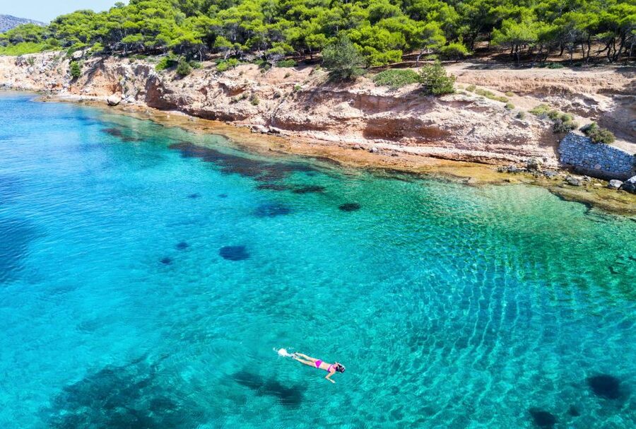 Athens: Full-Day Island Hopping Cruise with Lunch & Transfer - The wooden boat and the long ride across the Saronic Gulf
