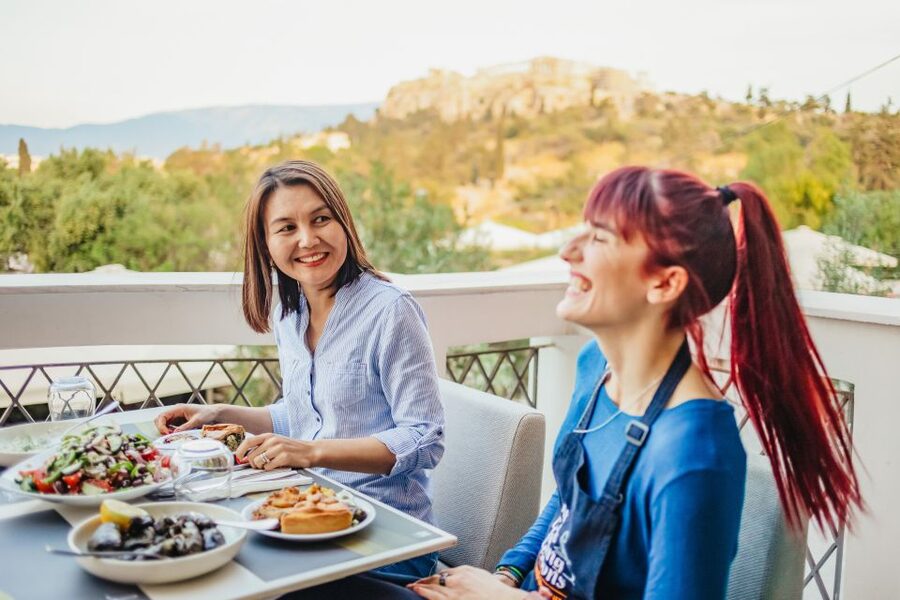Athens: Greek Cuisine Cooking Class and 3-Course Dinner - What the instructors add to the experience