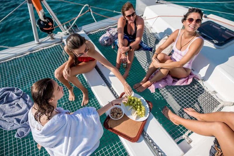 Athens: Half-Day Morning Catamaran Cruise with Meal & Drinks - Vouliagmeni Bay brings food and another swim