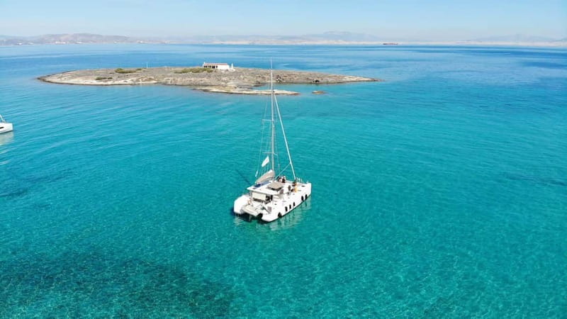 Athens: Half-Day Morning Catamaran Cruise with Meal & Drinks - Hydrousa Island is the first chance to swim