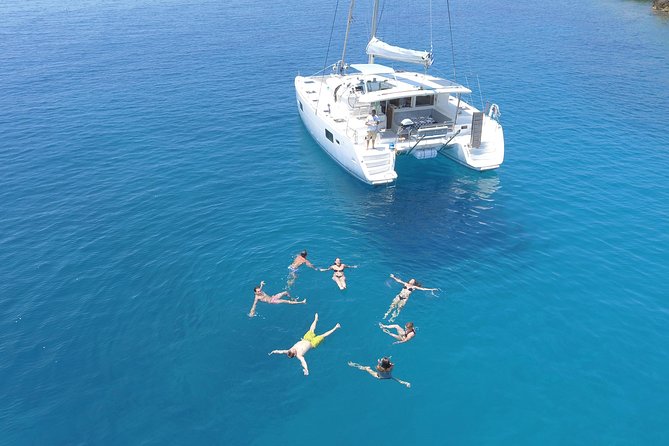 Athens Private Luxury Catamaran Cruise with Traditional Greek Meal and BBQ - A Greek BBQ served on board