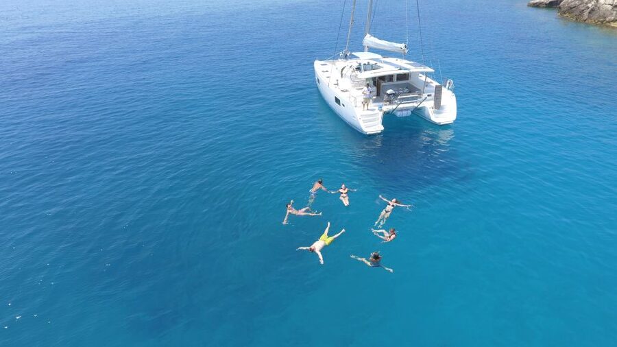Athens: Riviera Catamaran Cruise with Meal and Drinks - Vouliagmeni and the long onboard barbecue