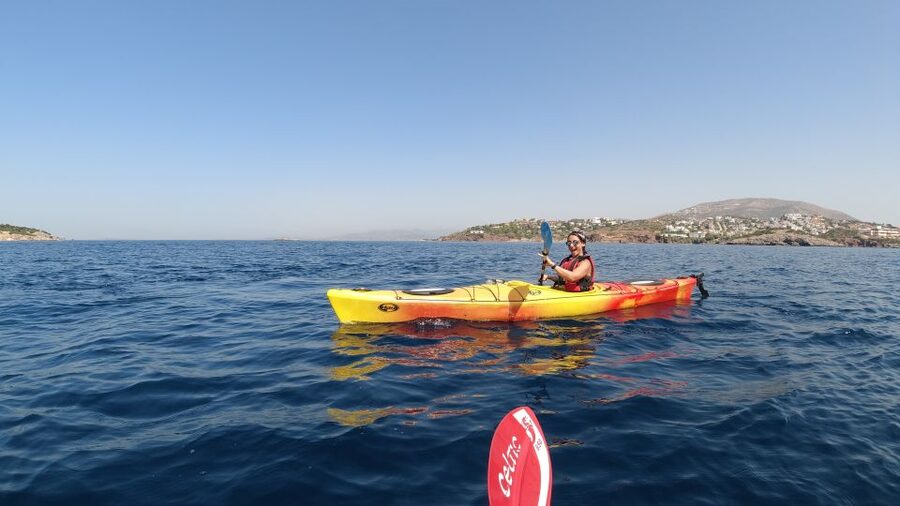Athens: Sea Kayak Sunset Tour - The swim and snorkeling stop