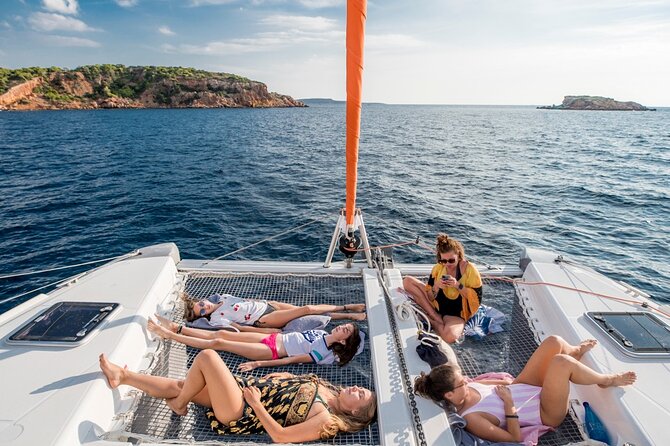 Athens Semi Private Sunset Catamaran Cruise with meal & drinks - Kavouri Beach and the sheltered waters near Hydrousa