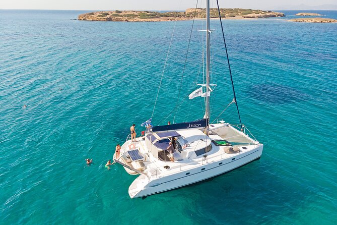 Athens Semi Private Sunset Catamaran Cruise with meal & drinks - The coast near Vouliagmeni Beach