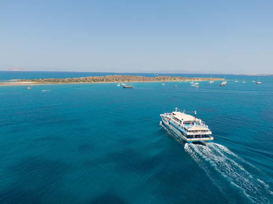 Athens: Swimming Cruise with Lunch, Wine & Live DJ on Board - Metopi: 40 minutes for repeated jumps into clear water