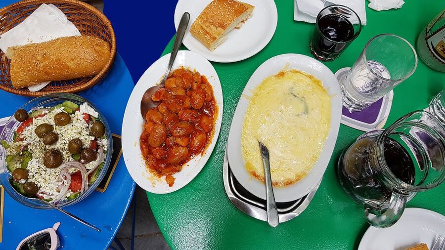 Athens: Traditional Greek food tour in hidden spots - Fish, meat, fruit, and spice stalls