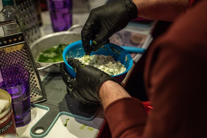 Cooking Class in Athens with Shopping in Central Market & Lunch - Cooking Greek dishes in a traditional taverna