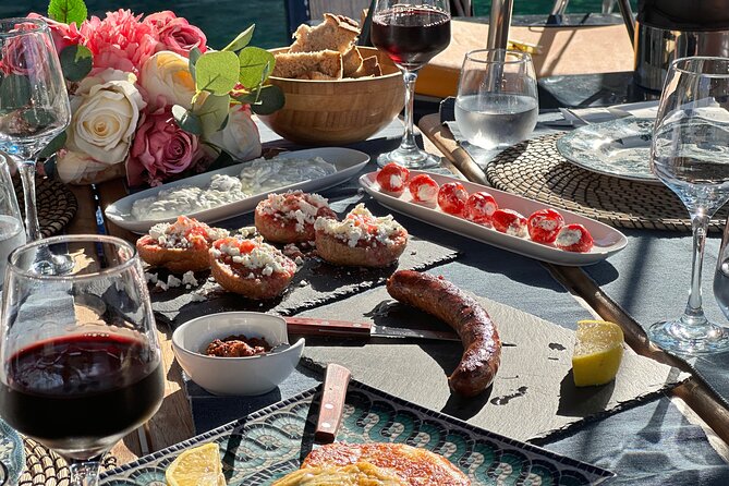 Greek Gastronomy & Wine Pairing Cruise with a Sommelier in Athens - Swimming and snorkeling in the Saronic Gulf