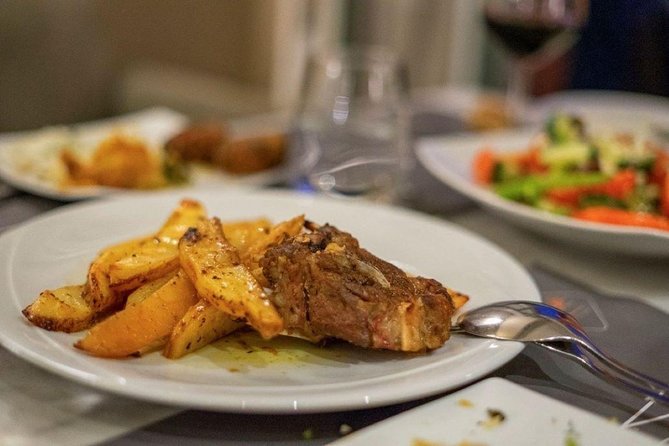 Greek Small-Group Athens Cooking Class & Dinner - Sitting down to eat what you prepared