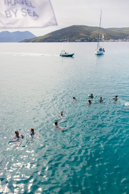 Half-Day Athens Cruise: Swim Stop,Lunch, and Drinks Included - Wine, Beer, and a Relaxed Boat Atmosphere