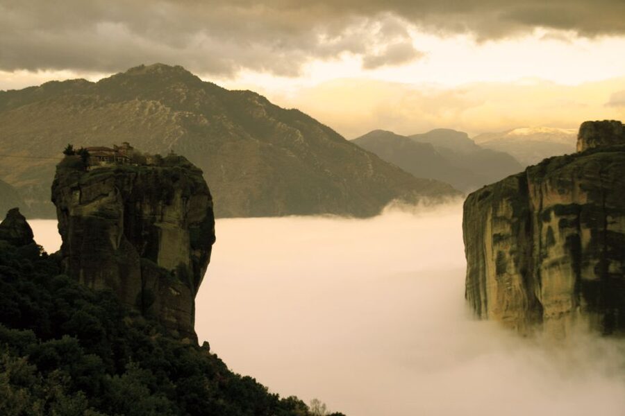 Kalabaka: Meteora Monasteries Minibus Tour with Photo Stops - St. George the Mandilas Cave and Meteora’s local traditions
