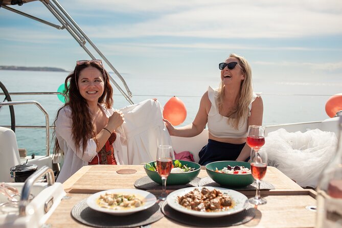 Luxury Catamaran Sunset Private & Greek Gastronomy in Athens - Sunset views on the return to Alimos
