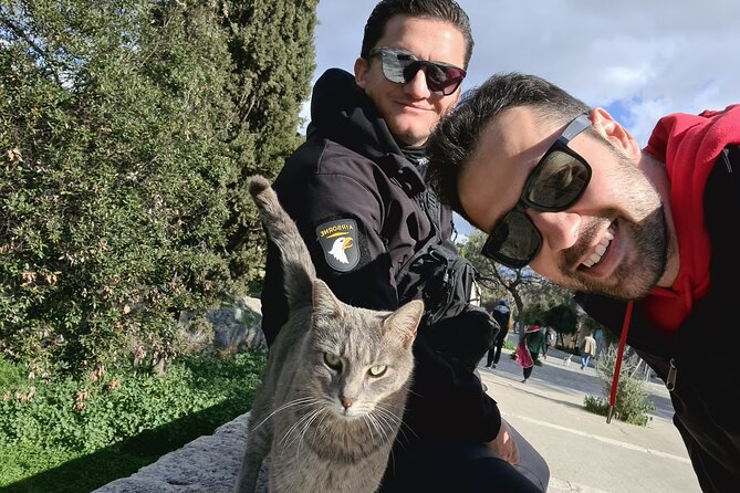 Meet the Cats of Acropolis and Thissio Private Tour - Thissio, green paths below the ancient rock