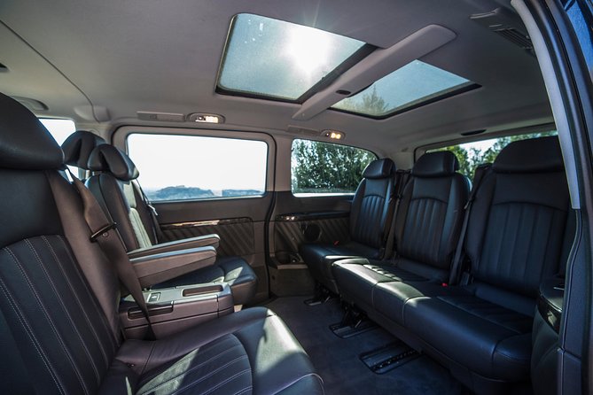 Piraeus port to Athens hotels Private arrival transfer - Luggage help, bottled water, and onboard WiFi