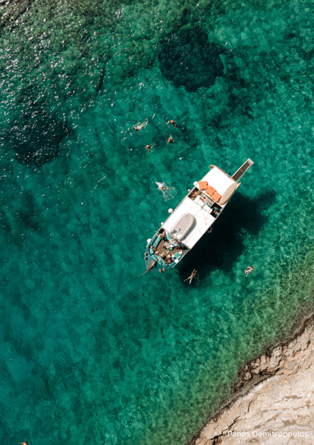 Porto Rafti: Athens Cruise Tour with Mediterranean BBQ - Porto Rafti, the Colossus, and the Blue Lagoon