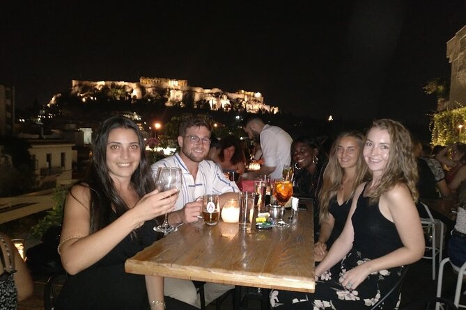Rooftop Bar Hopping with Local Friends - The second and third rooftops: shots and changing views