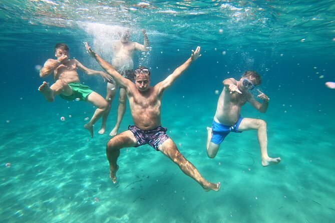 Sail the Athenian Coastline on a Catamaran with Meal & Wine - Stop two: the broad waters of Vouliagmeni Bay