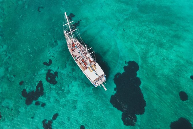 Sunset Dinner Cruise: Sunset, Swim, Drinks, and Dinner Onboard - A sunset cruise built around swimming, not sightseeing