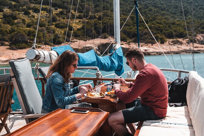 Sunset Dinner Cruise: Sunset, Swim, Drinks, and Dinner Onboard - Vouliagmeni and the second swim