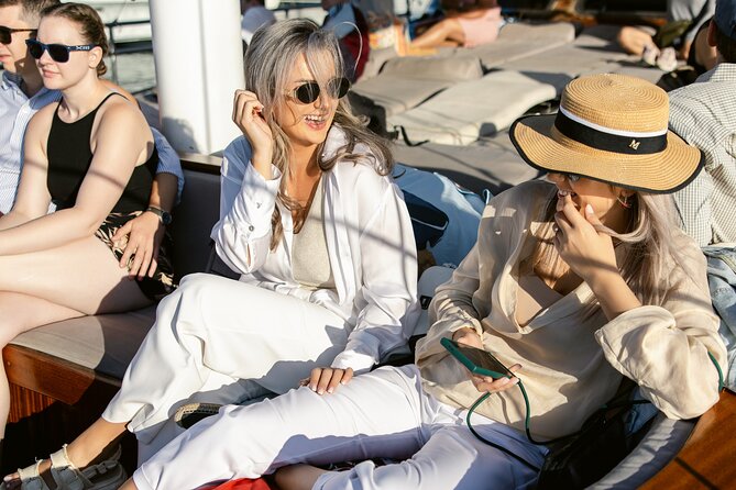 Sunset Dinner Cruise: Sunset, Swim, Drinks, and Dinner Onboard - Beer, wine, and the value of the $145.97 fare