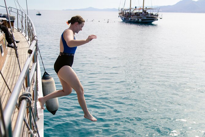 Sunset Dinner Cruise: Sunset, Swim, Drinks, and Dinner Onboard - Sunset views from the deck