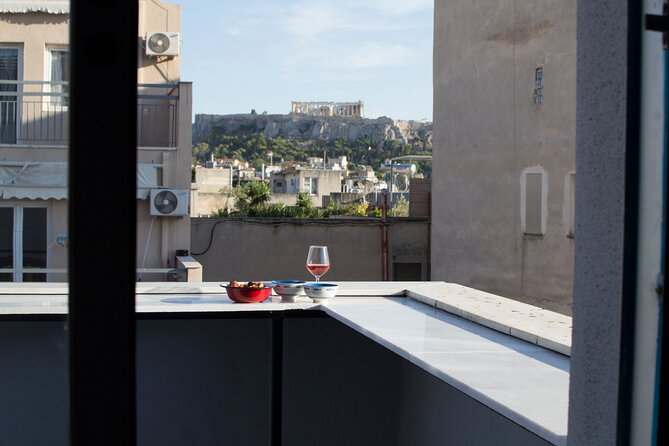 Traditional Greek cooking class and lunch or dinner with an Acropolis view - Greek salad, seasonal produce, and the main course